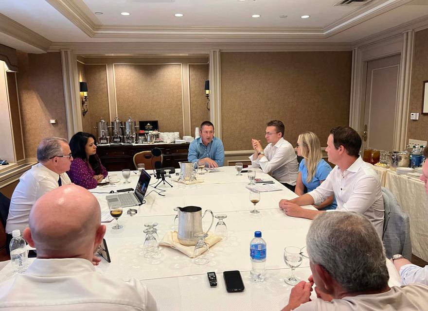 Eight business people attending Fund Structuring International roundtable