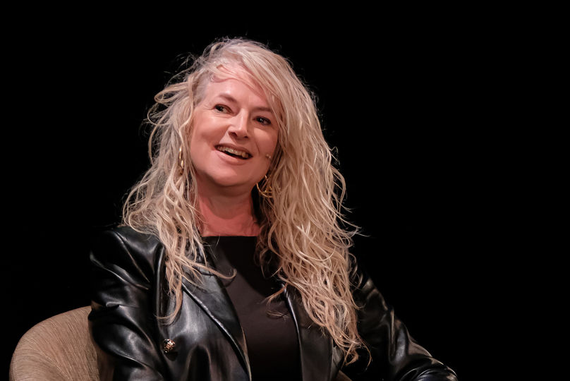Sam McAlister speaking at an event