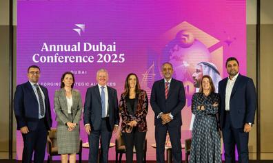 Line-up of event speakers on stage