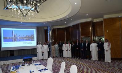 A line-up of business people in a conference room