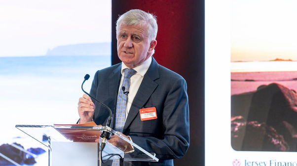 Joe Moynihan at a podium speaking at our Global Horizons event