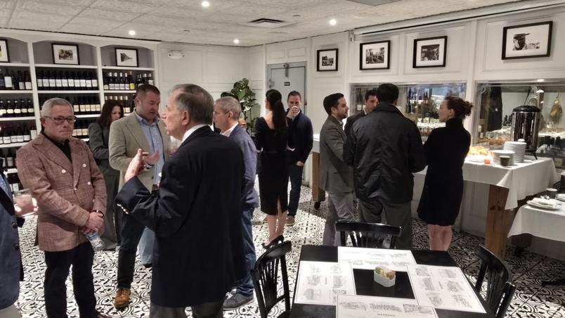 Guests talking at Jersey Finance's 'Bulls, Bears and Bagels' breakfast event in Miami in January 2026