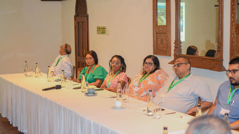 Buiness people sat around a table