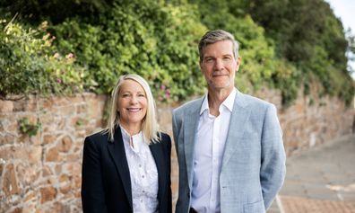 Jennie Ekedahl and Paul Lawrence standing outside